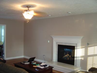https://www.housepaintingtutorials.com/images/our-freshly-painted-taupe-color-family-room-21454035.jpg