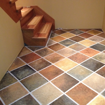 Sponge painting also lets you create the look of tile even on a linoleum floor
