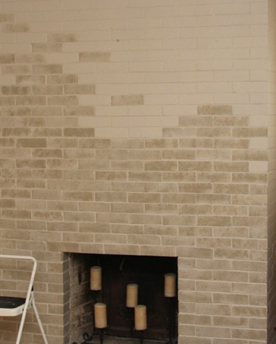 Fireplace brick wall enhanced with subtle paint sponging