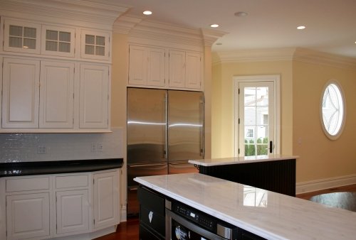 Kitchen and dining room painted a light, soft yellow