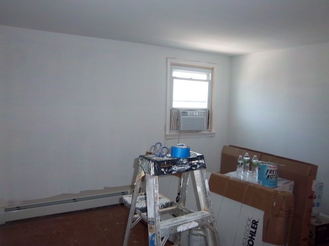 Before: unpainted walls in bedroom