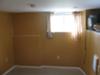 Freshly painted orange bedroom in the basement